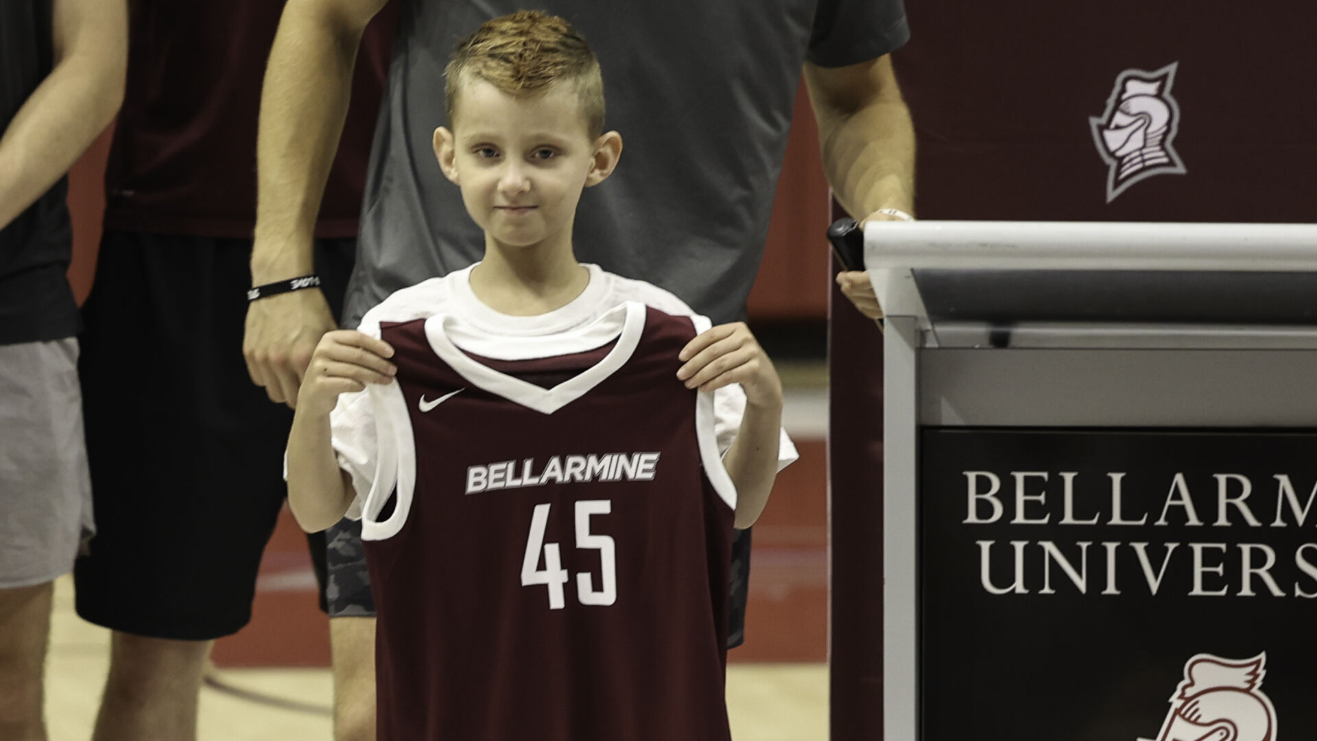 CRAWFORD | Seth Walsh, age 7 and a cancer survivor, signs on with Bellarmine hoops